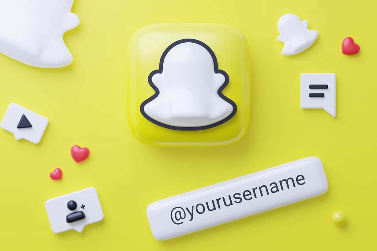 Snapchat Logoand Social Media Elements Wallpaper