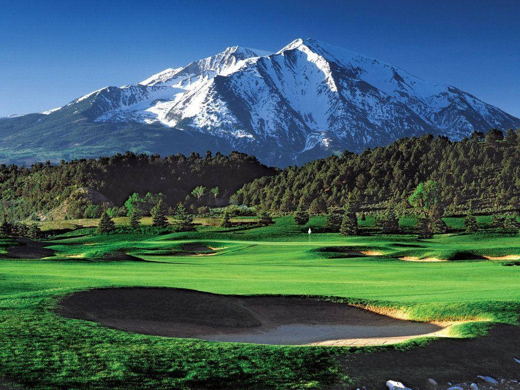 Snow-capped Mountain Golfing Desktop Wallpaper