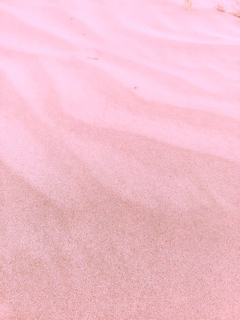 Soak Up The Tranquility Of A Beautiful Pink Beach Aesthetic Surrounded By Nature Wallpaper