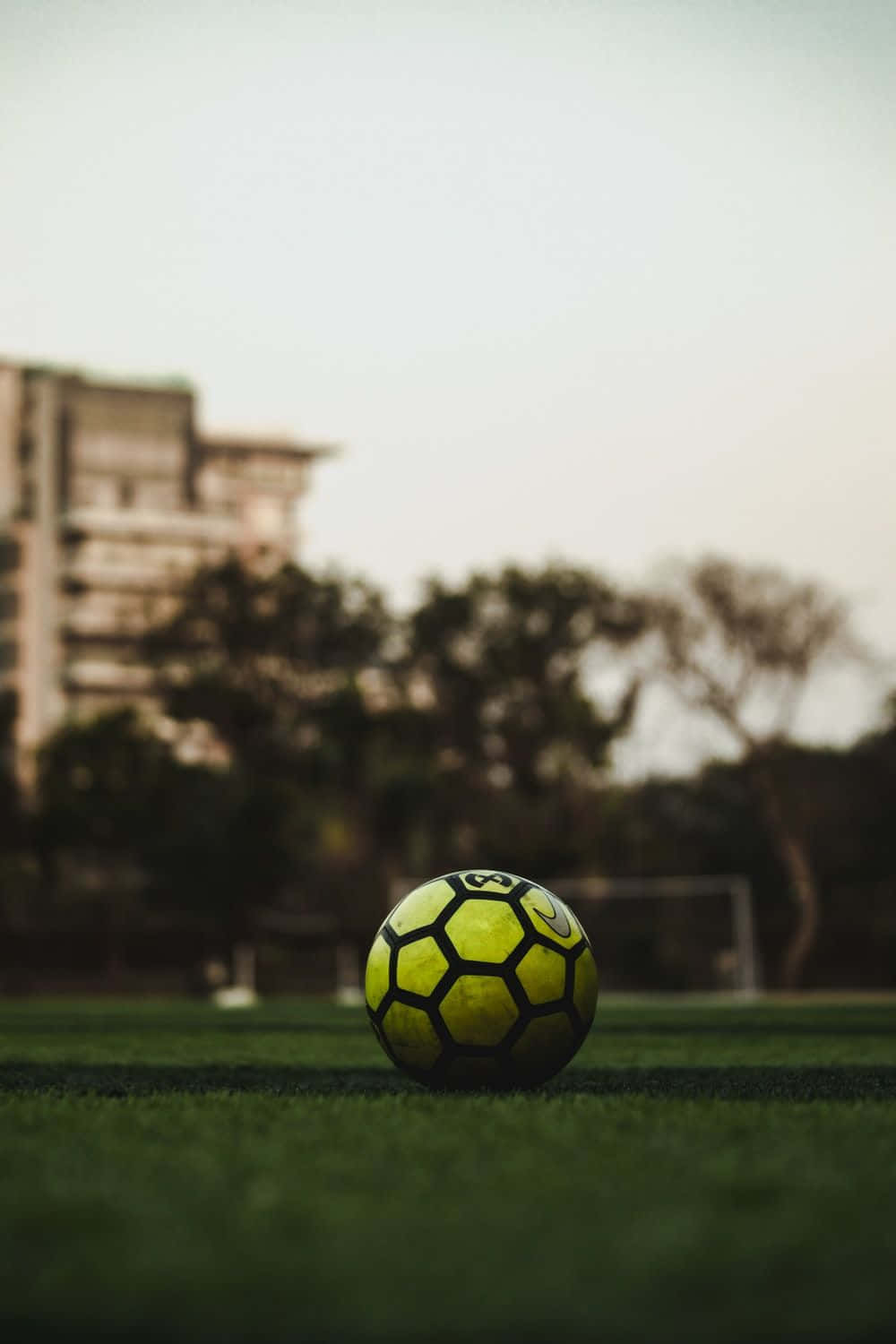 Soccer Ballon Fieldat Dusk Wallpaper