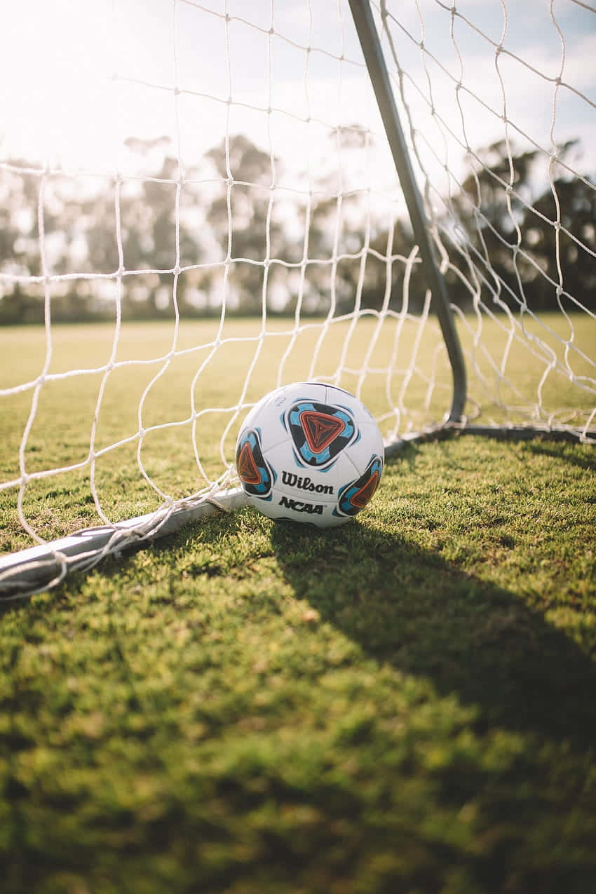 Soccer Goal Post At Sunrise Wallpaper