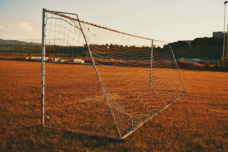 Soccer Goal Post Sunset Field Wallpaper