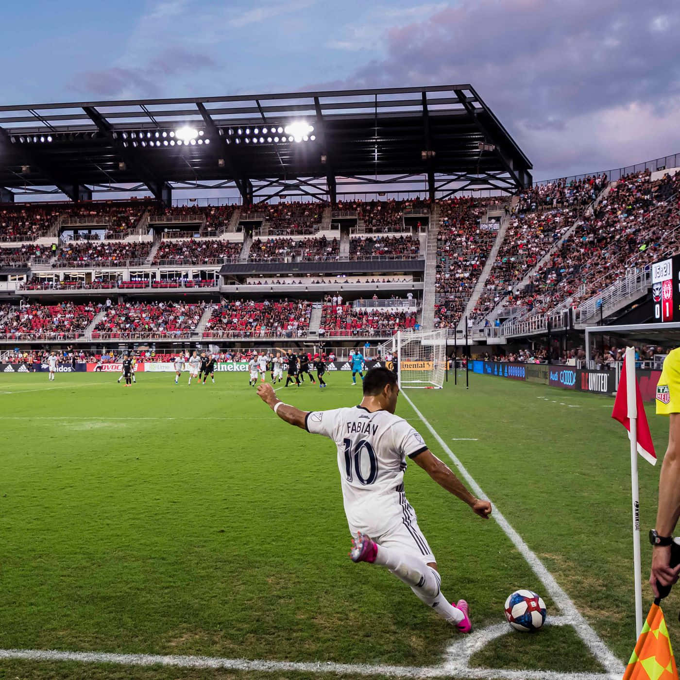 Soccer_ Player_ Taking_ Corner_ Kick_ Stadium Wallpaper