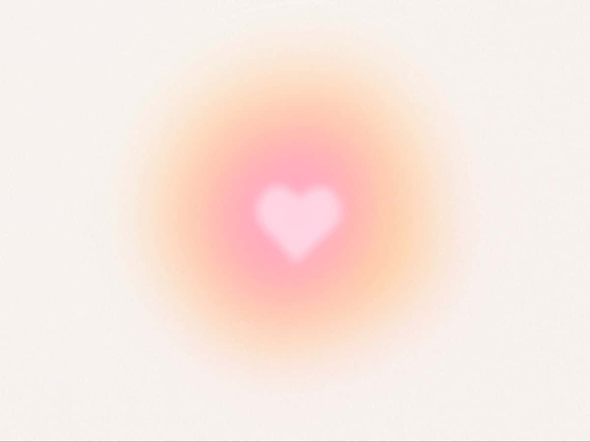 Soft Heart Glow Background Wallpaper