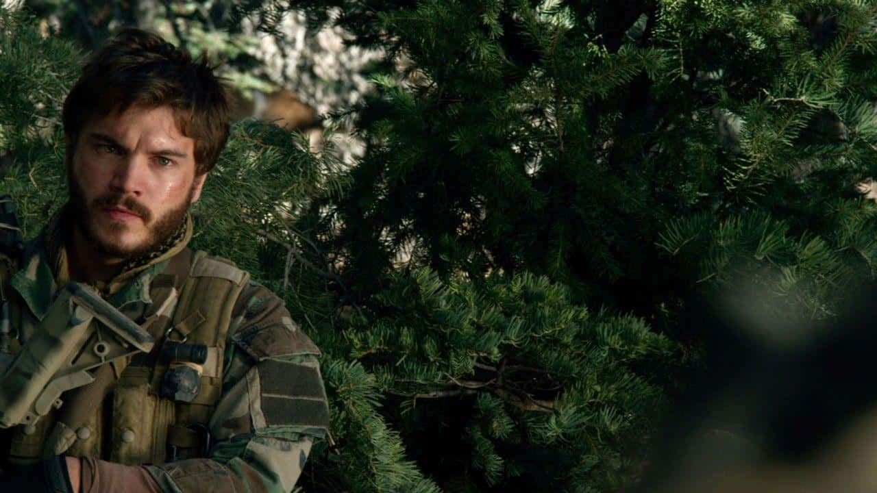 Soldier_ In_ Woodland_ Camouflage Wallpaper