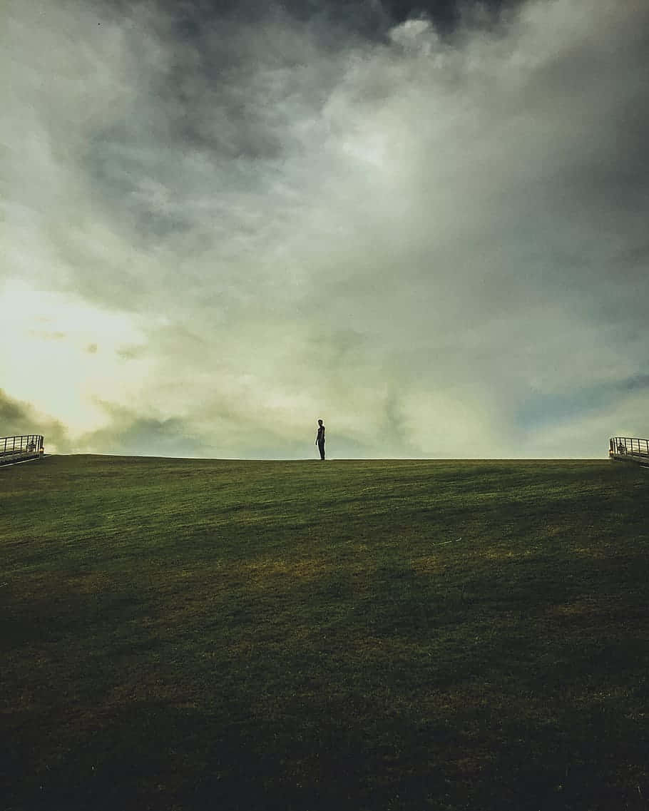 Solitary Man In Fields Wallpaper