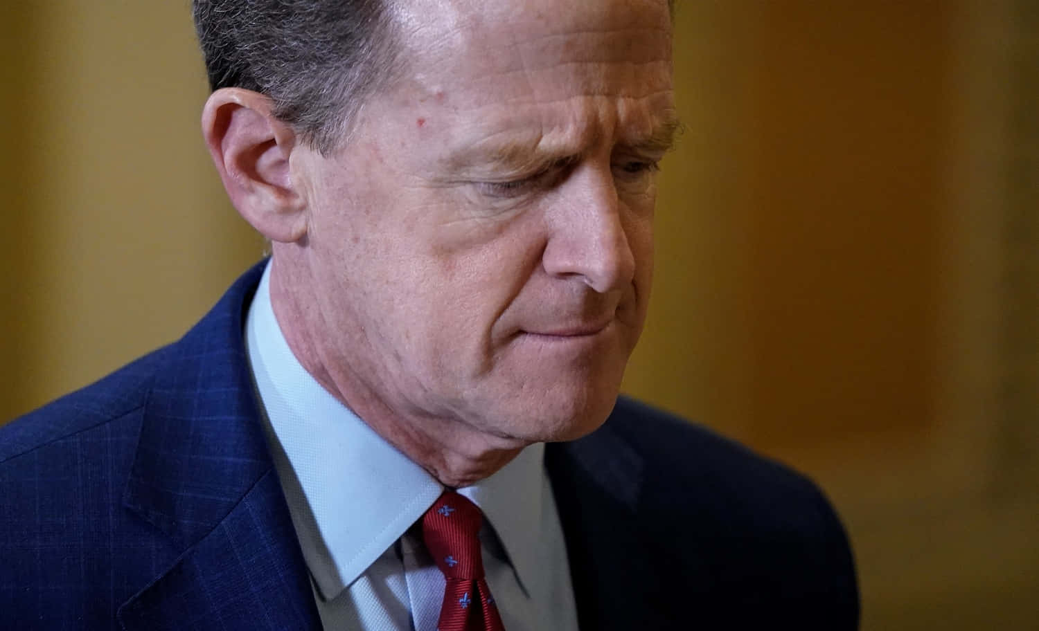 Somber Pat Toomey Wallpaper