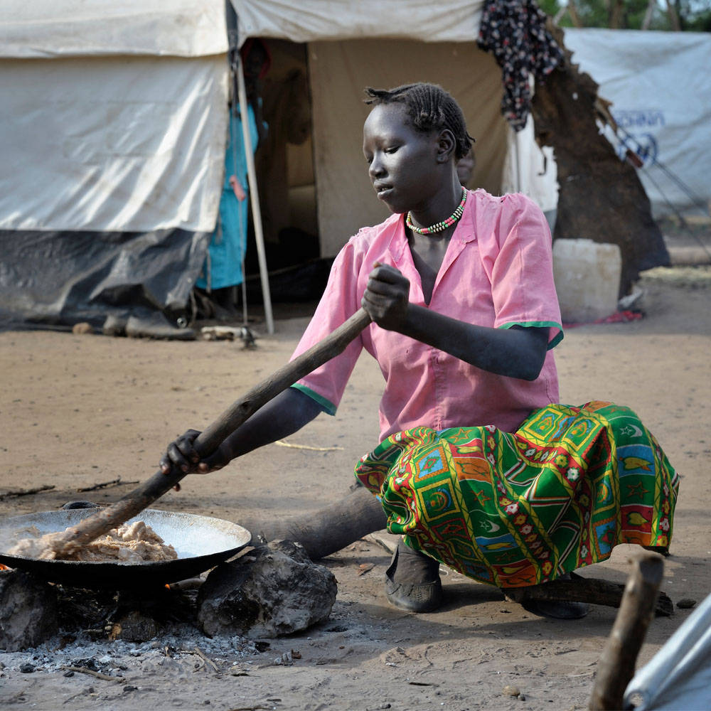 South Sudan Pink Shirt Cooking Wallpaper