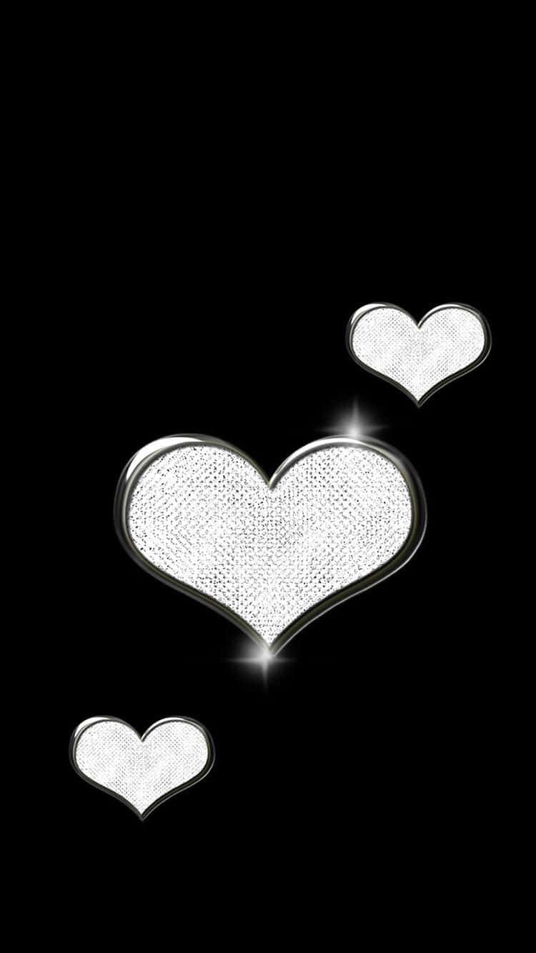 Sparkling Heartson Black Background Wallpaper