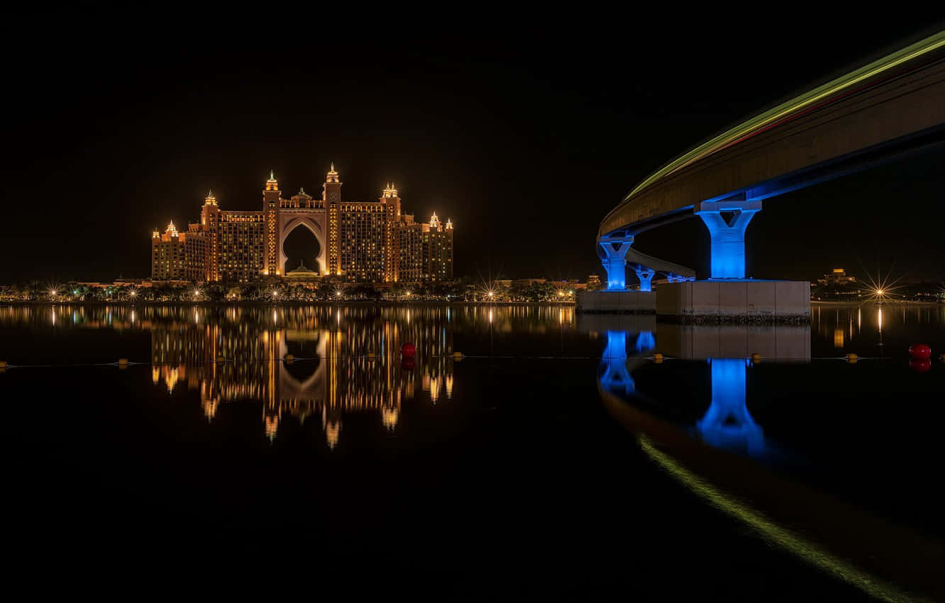 Spectacular View At Night In Atlantis Resort Wallpaper