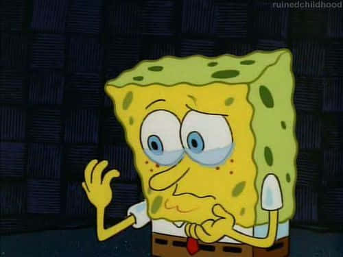 Spongebob Crying Looking At His Hand Wallpaper