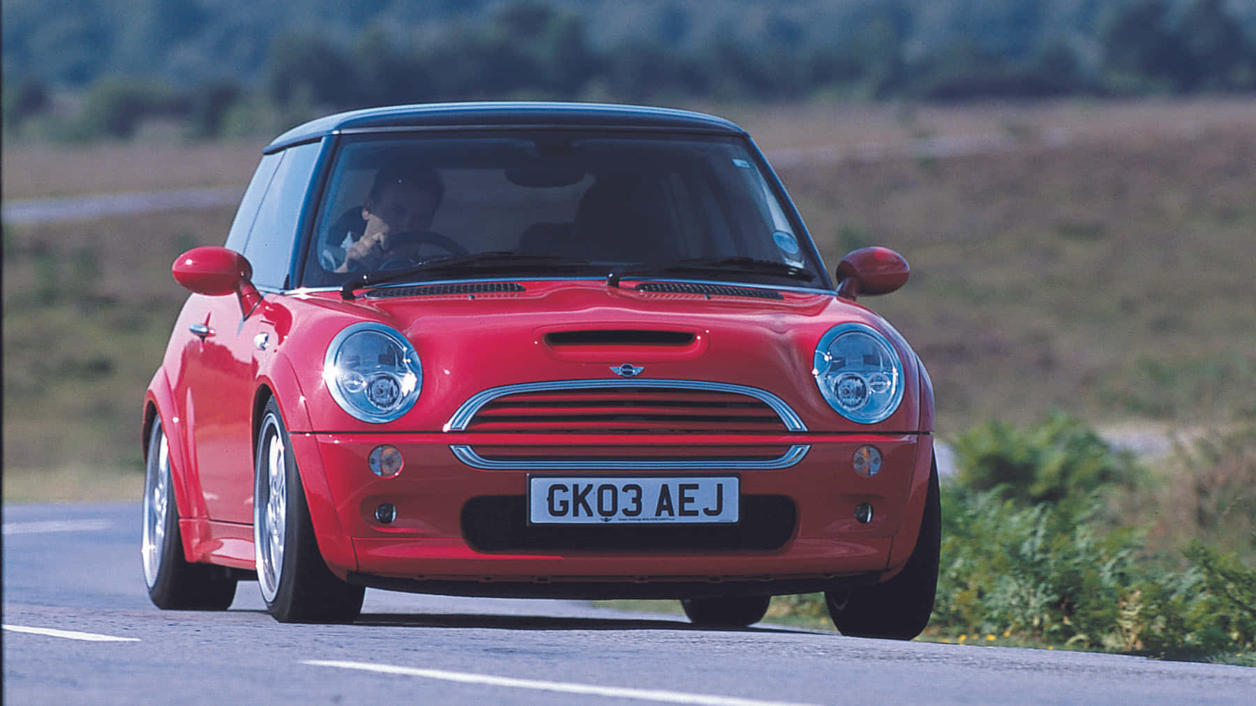 Sporty And Sleek Mini Cooper S On The Open Road Wallpaper