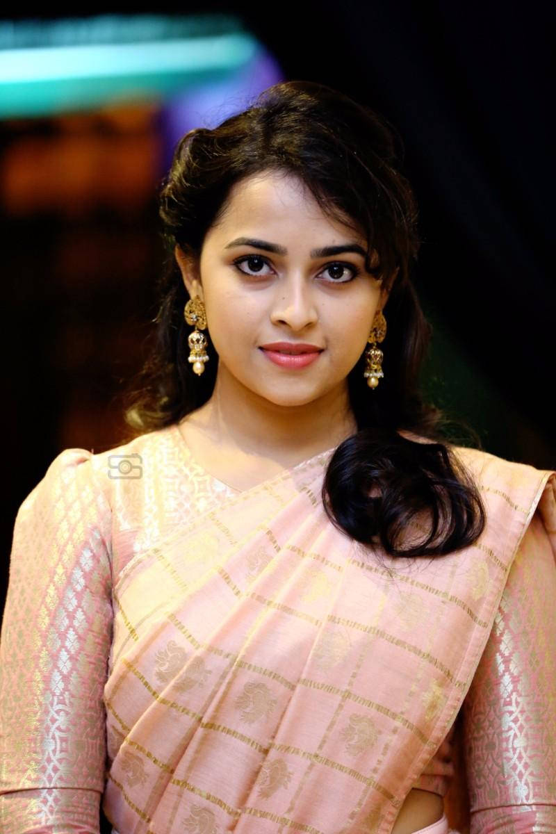 Sri Divya In Pastel Pink Dress Wallpaper