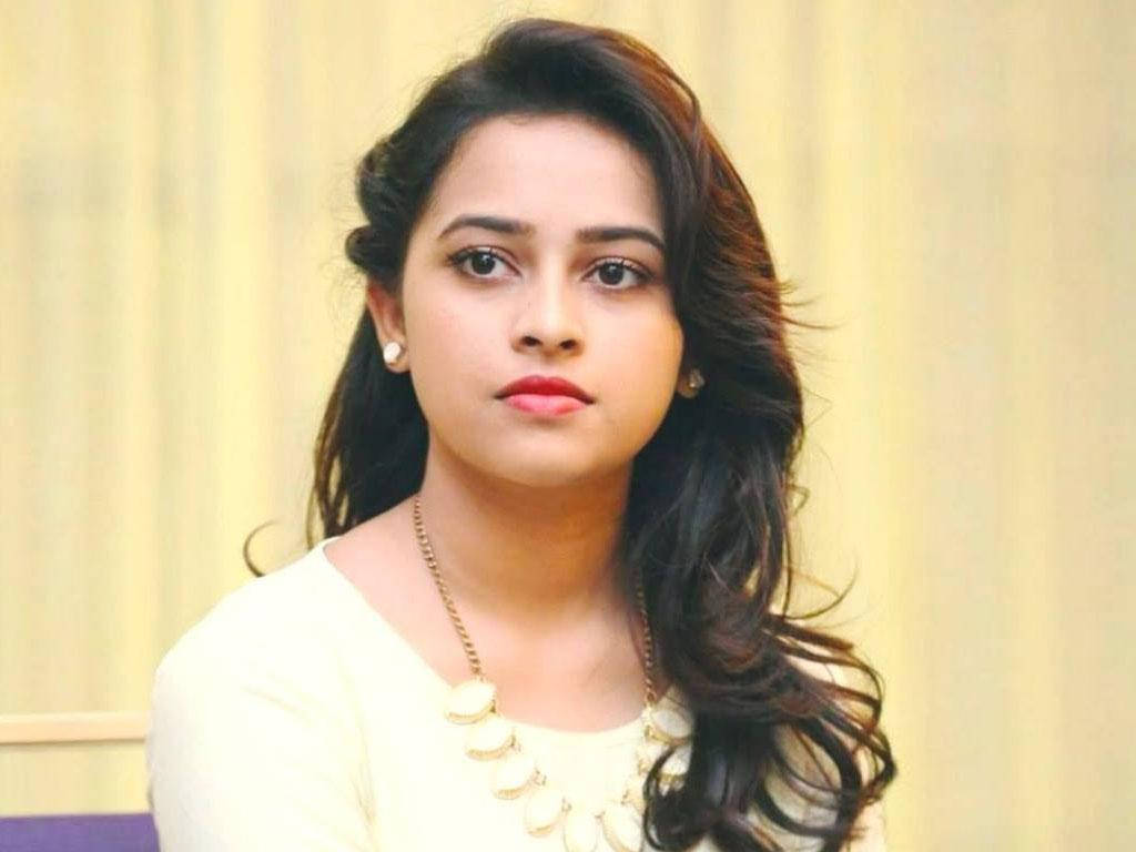 Sri Divya, The Radiant Star Of South Indian Cinema Wallpaper