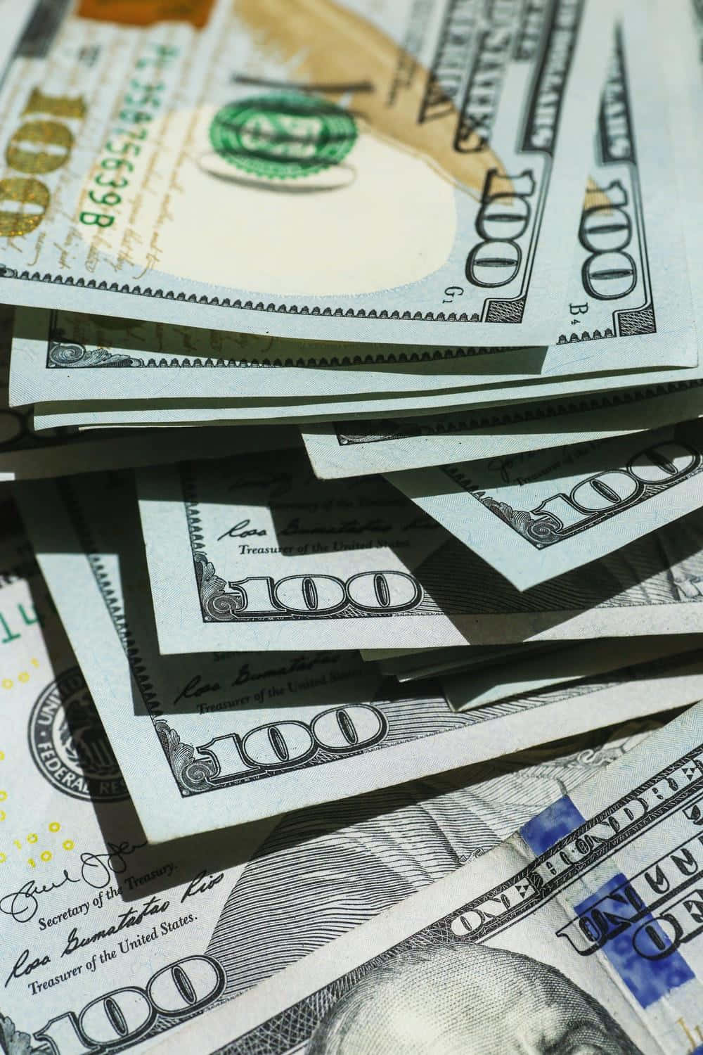 Stacked U S Dollars Closeup Wallpaper