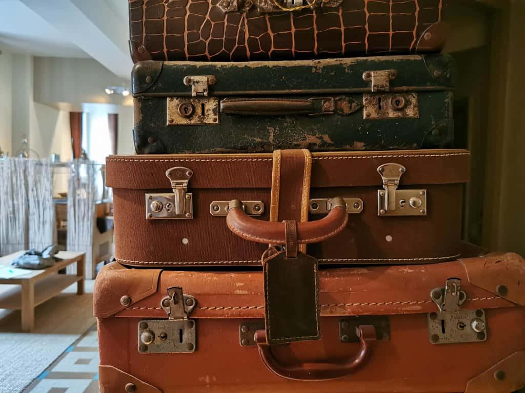 Stacked Vintage Suitcases Wallpaper