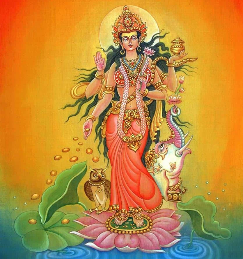 Standing Lakshmi Devi On A Pond Wallpaper