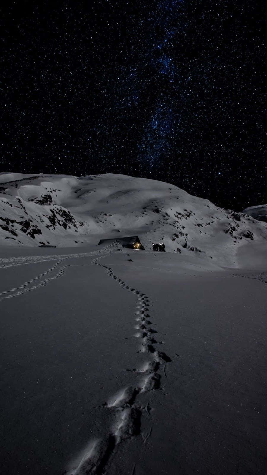 Starry Night Snowscapewith Cabin Wallpaper