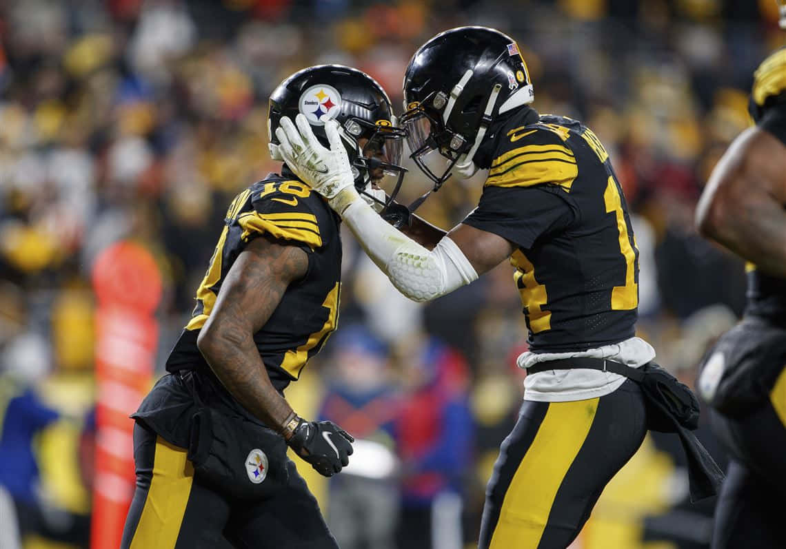 Steelers Players Celebrating On Field Wallpaper