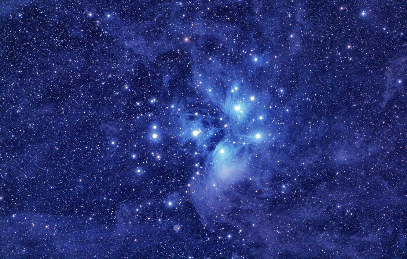 Stellar Beauty: A Glimpse Of A Radiant Star Cluster Wallpaper