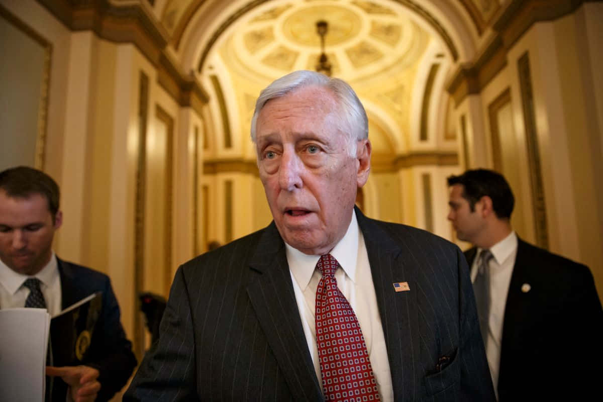 Steny Hoyer In Lit Hallway Wallpaper