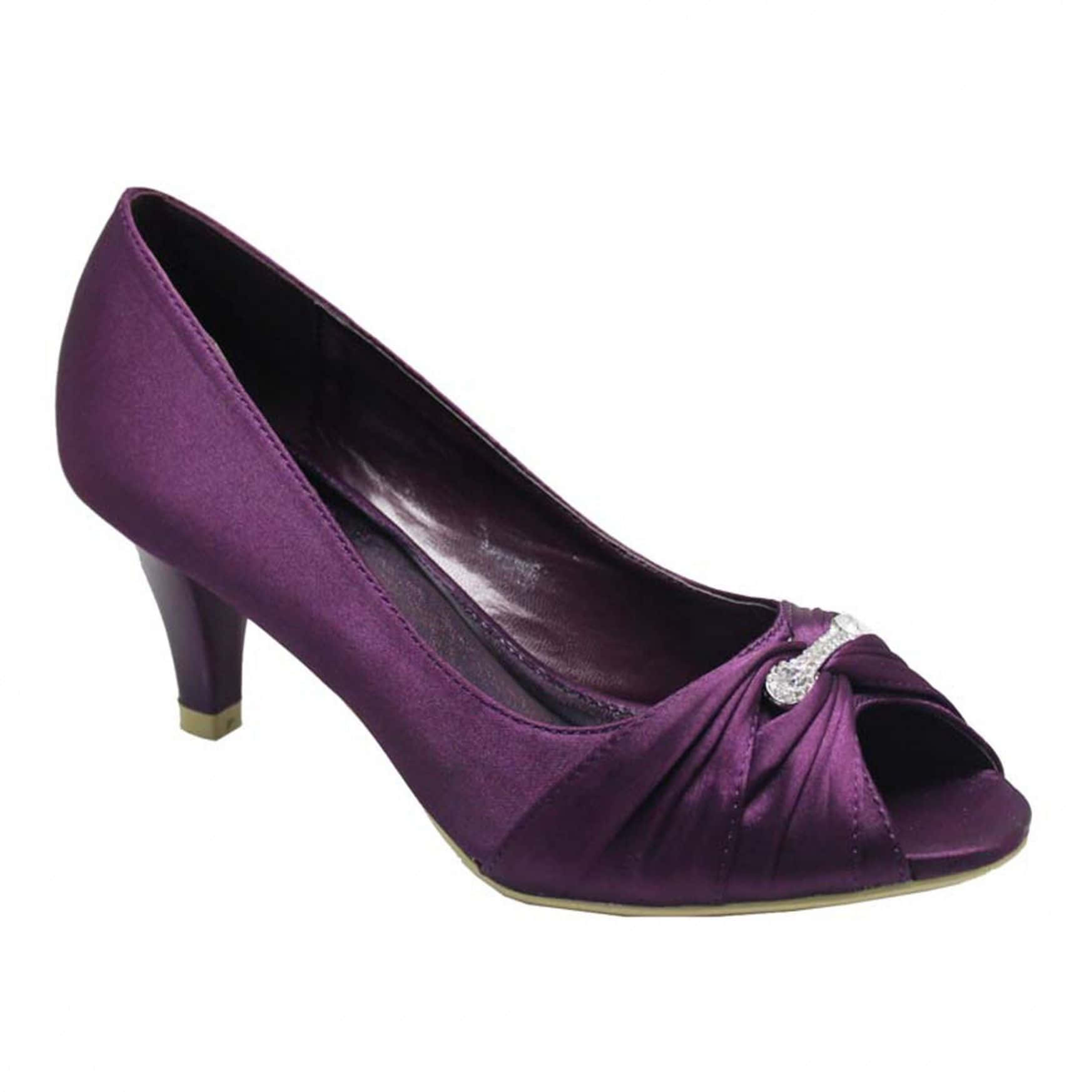 Step Out In Style In Purple Shoes Wallpaper