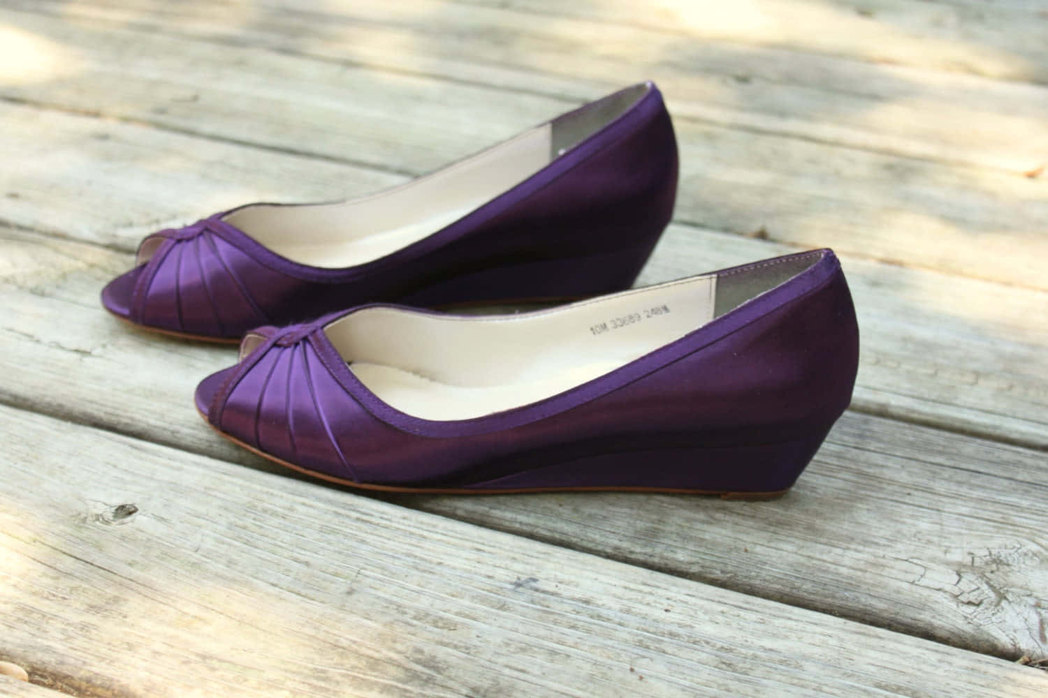 Step Out In Style With A Pair Of Purple Shoes Wallpaper