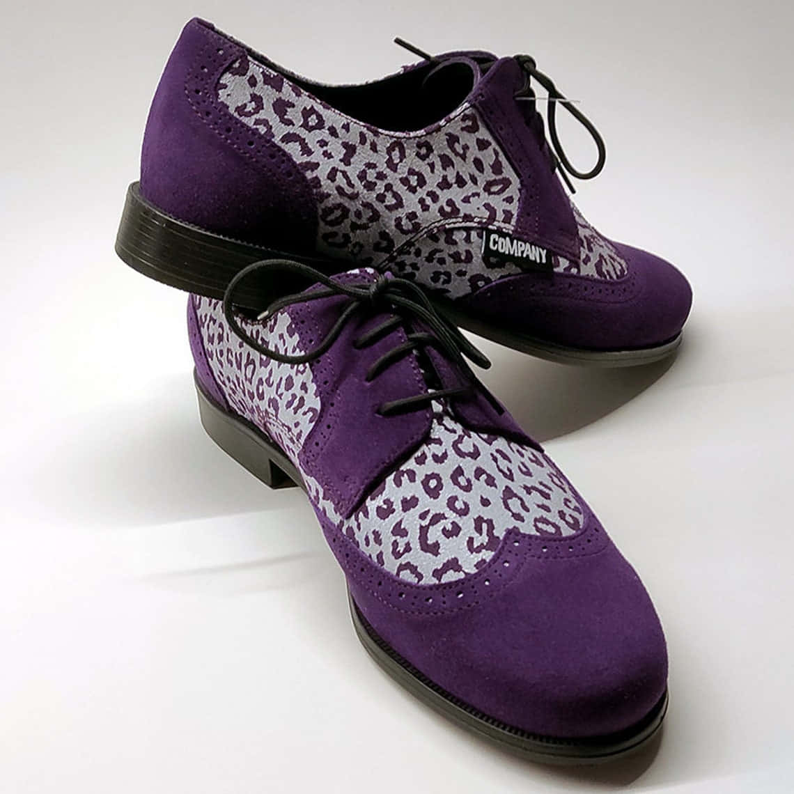 Step Out In Style With Purple Shoes Wallpaper