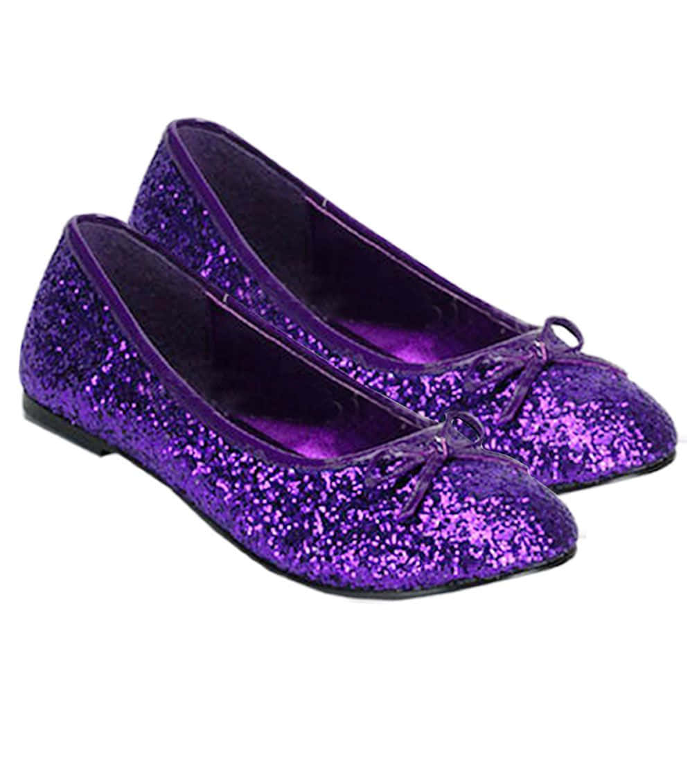 Step Up Your Style With A Pair Of Eye-catching Purple Shoes Wallpaper