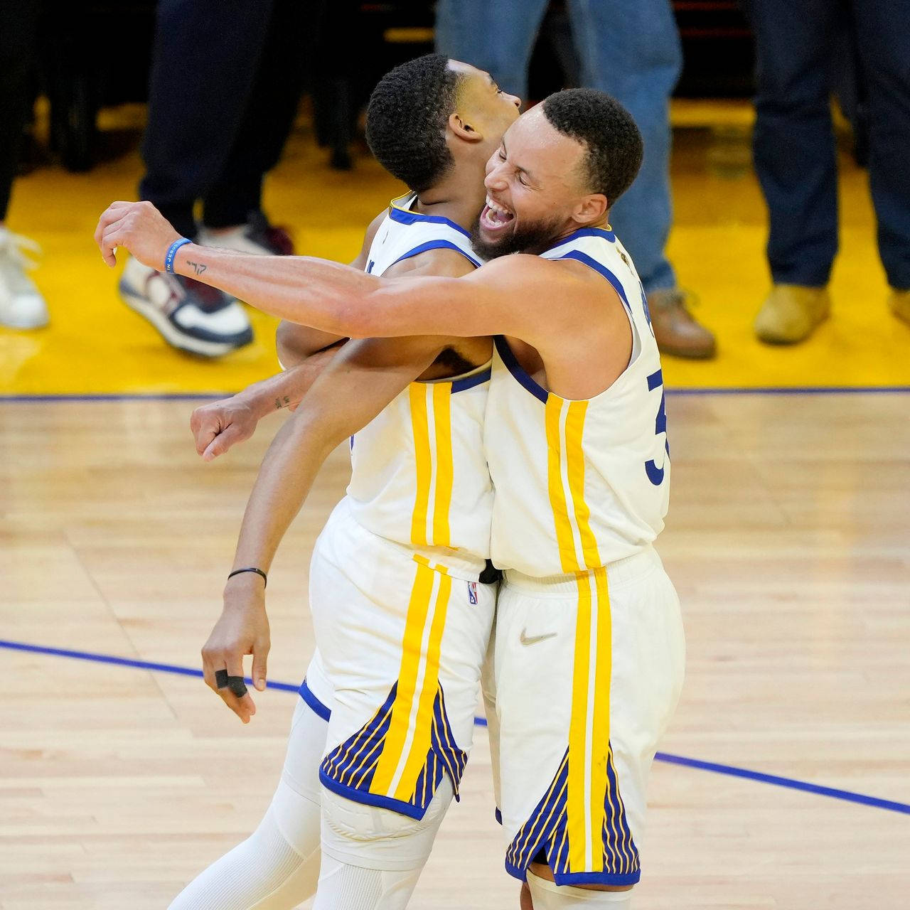 Steph Curry Chest Bumps Jordan Poole Wallpaper