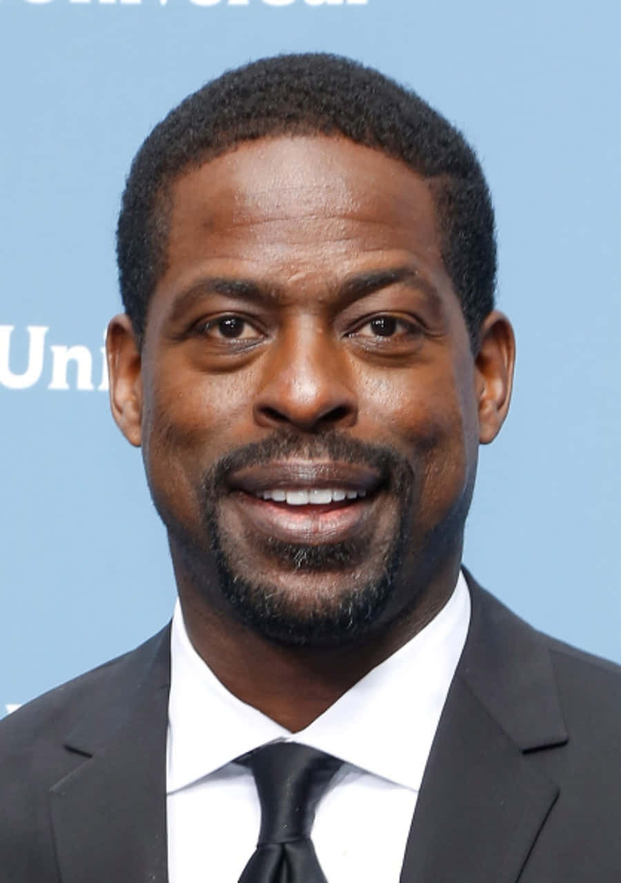 Sterling K Brown Looks Cool And Confident In Front Of The Camera Wallpaper