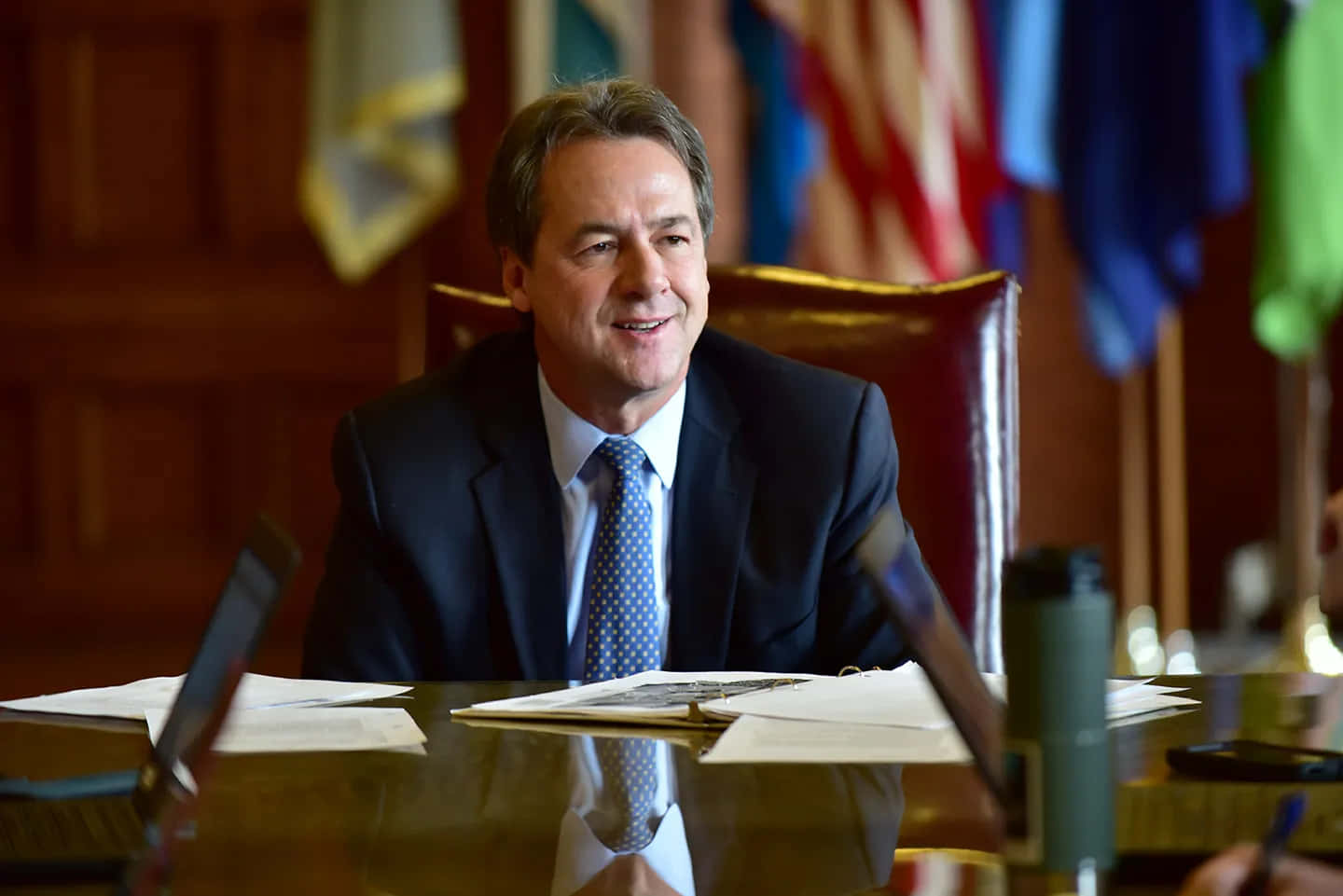 Steve Bullock Sitting On Chair Wallpaper