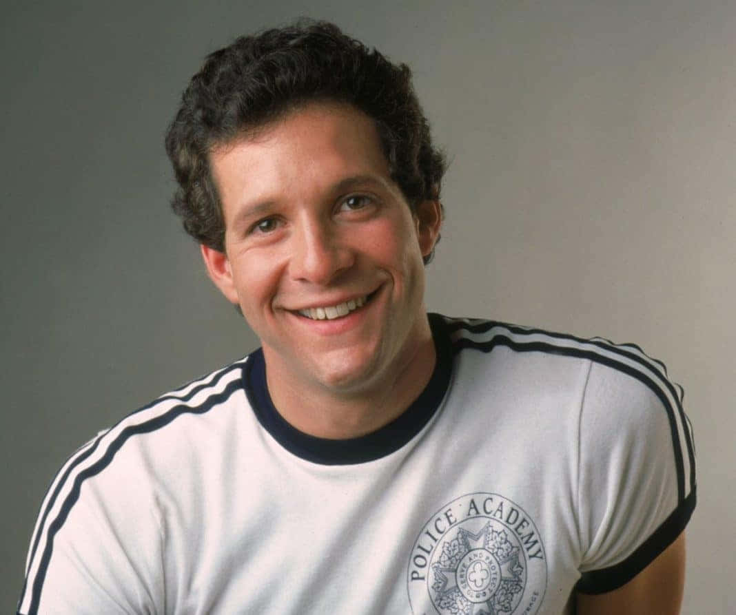 Steve Guttenberg In His Classic 80s Role Wallpaper