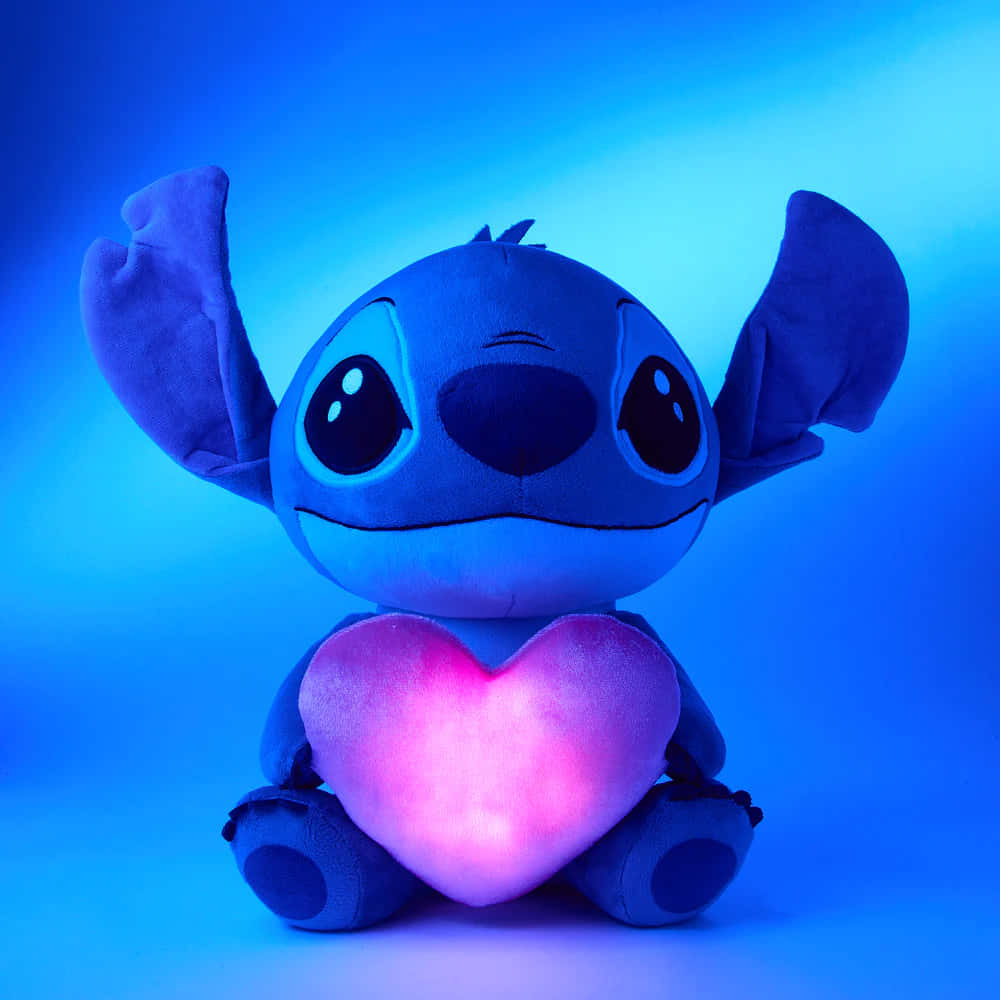 Stitch Plush With Heart Glow Wallpaper