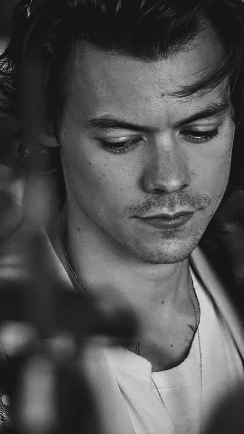 Stolen Shot Of Harry Styles Black And White Wallpaper