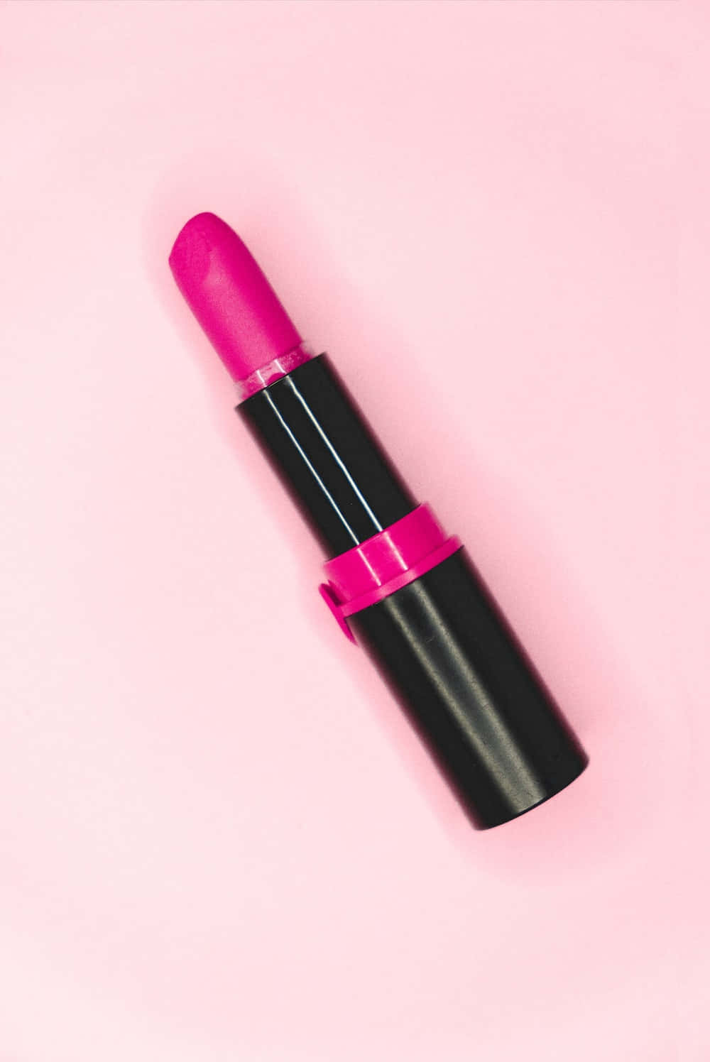 Striking Pink Lipstick On Luscious Lips Wallpaper