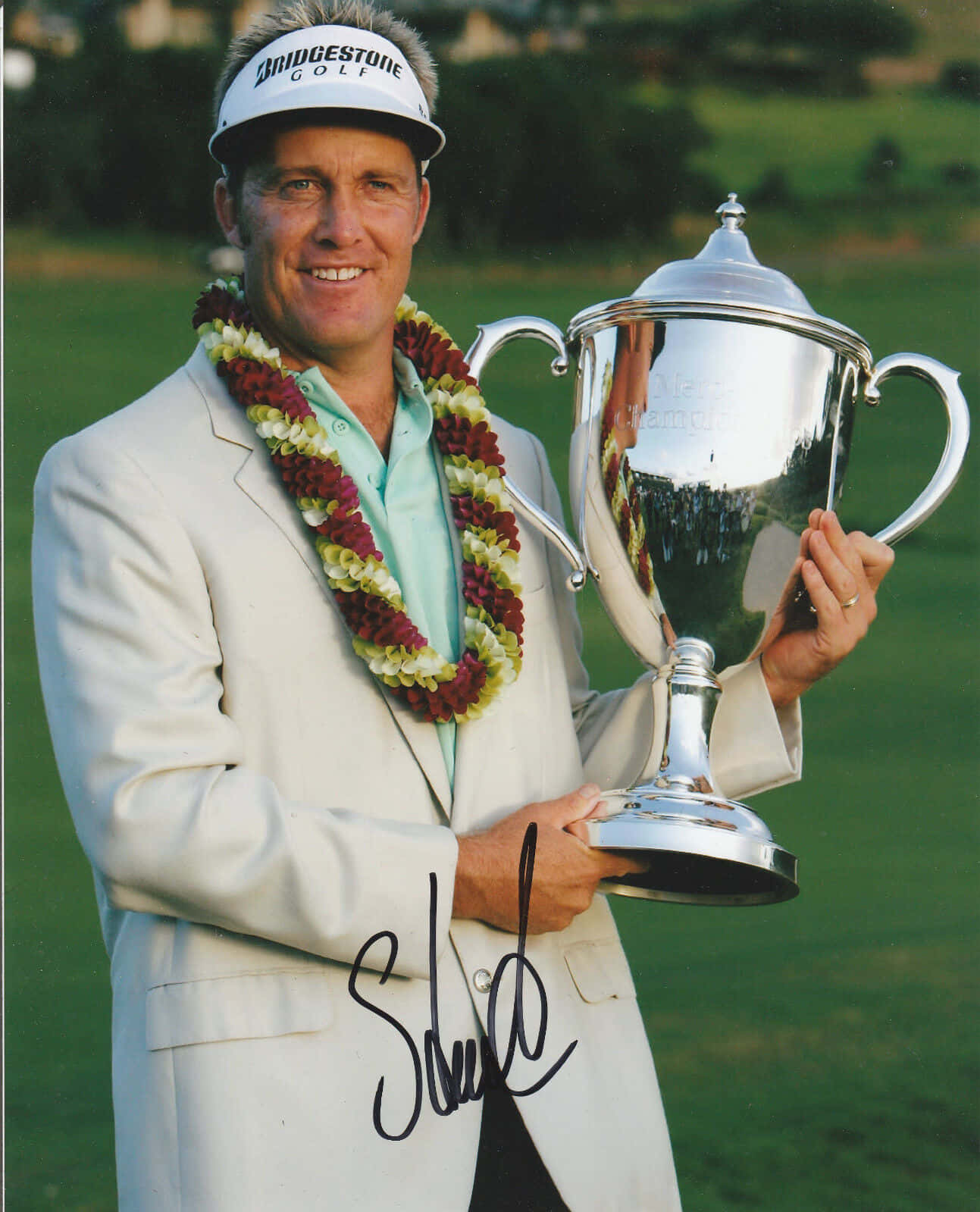 Stuart Appleby Holding A Silver Trophy Wallpaper