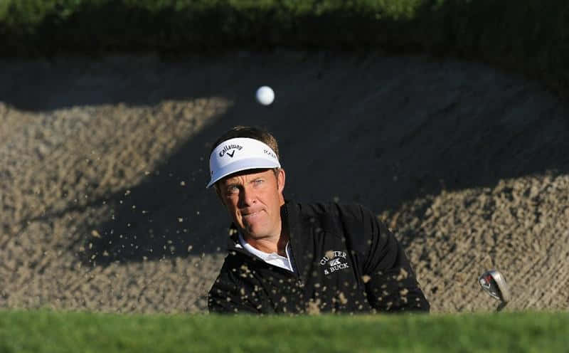 Stuart Appleby Watching A Golf Ball After Teeing Wallpaper