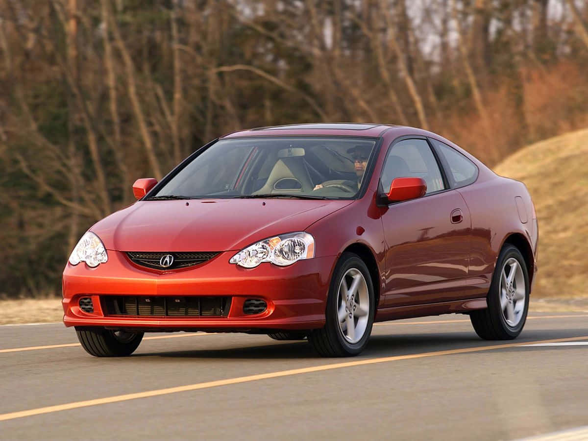 Stunning Acura Rsx In Action On The Open Road Wallpaper