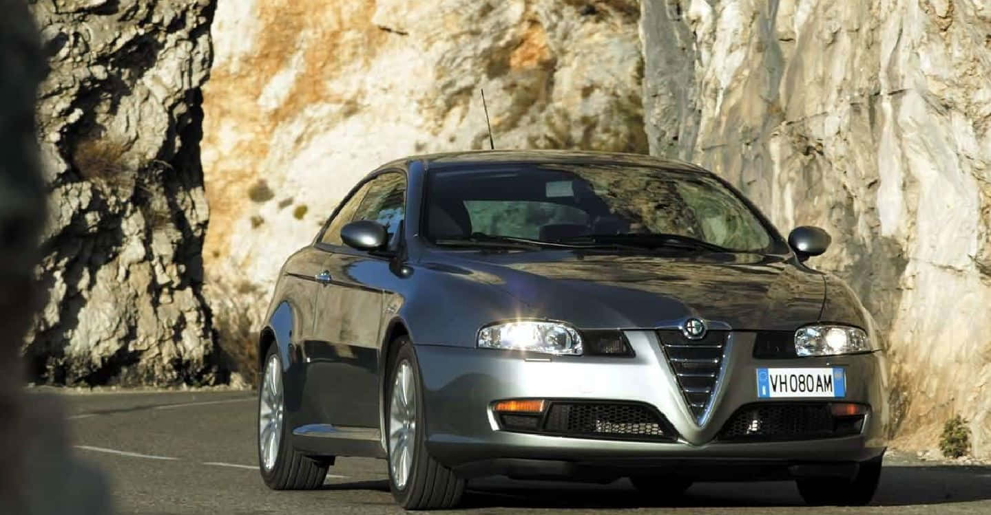 Stunning Alfa Romeo Gt In Action Wallpaper