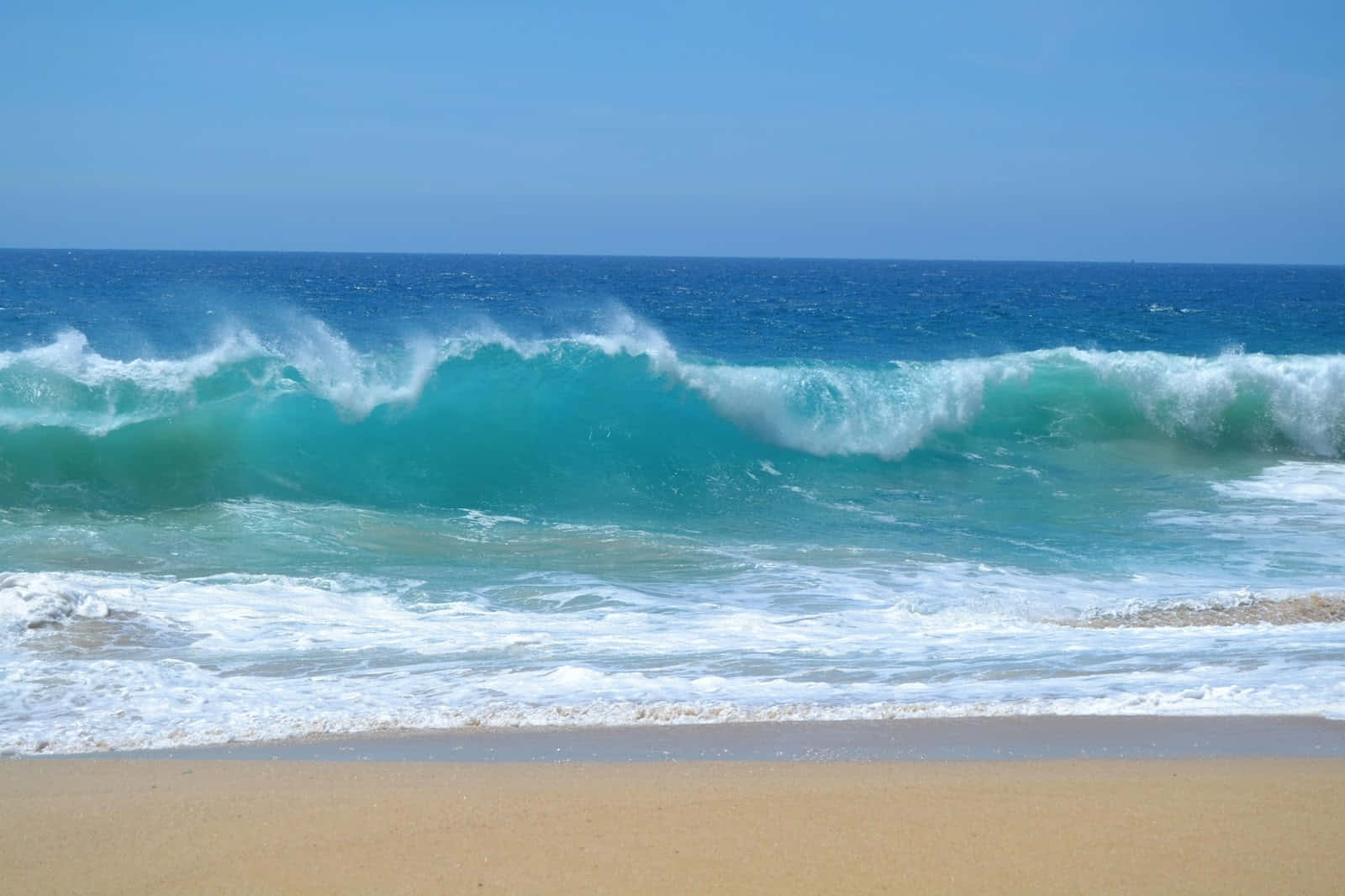 Stunning Beach Waves At Sunrise Wallpaper