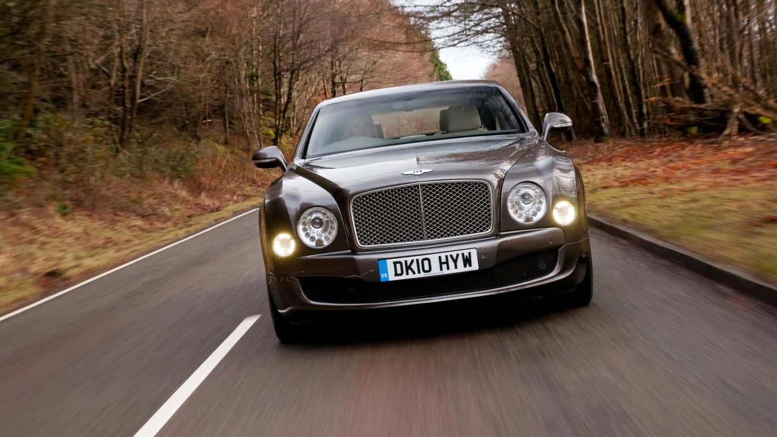 Stunning Bentley Mulsanne Cruising Down The Highway Wallpaper