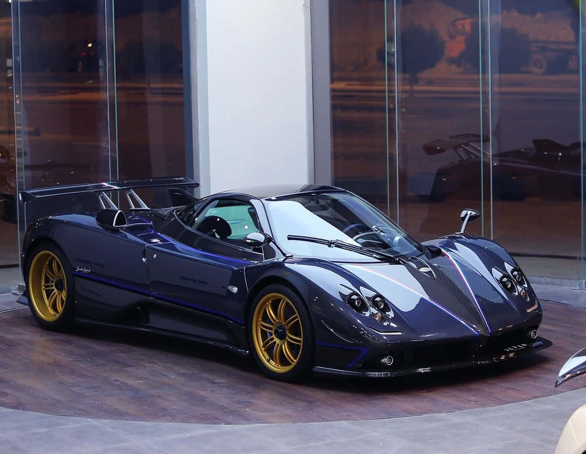 Stunning Blue Pagani Zonda Tricolore On The Open Road. Wallpaper