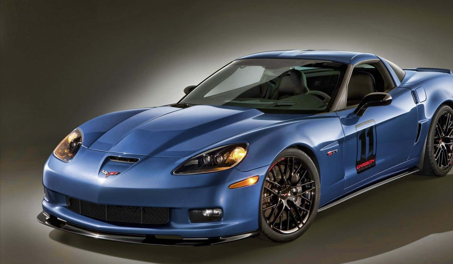 Stunning Chevrolet Corvette Z06 In Motion Wallpaper