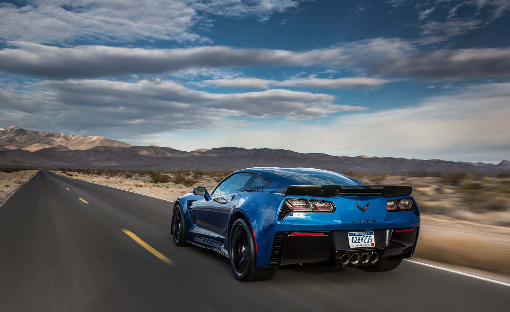 Stunning Chevrolet Corvette Z06 On The Road Wallpaper