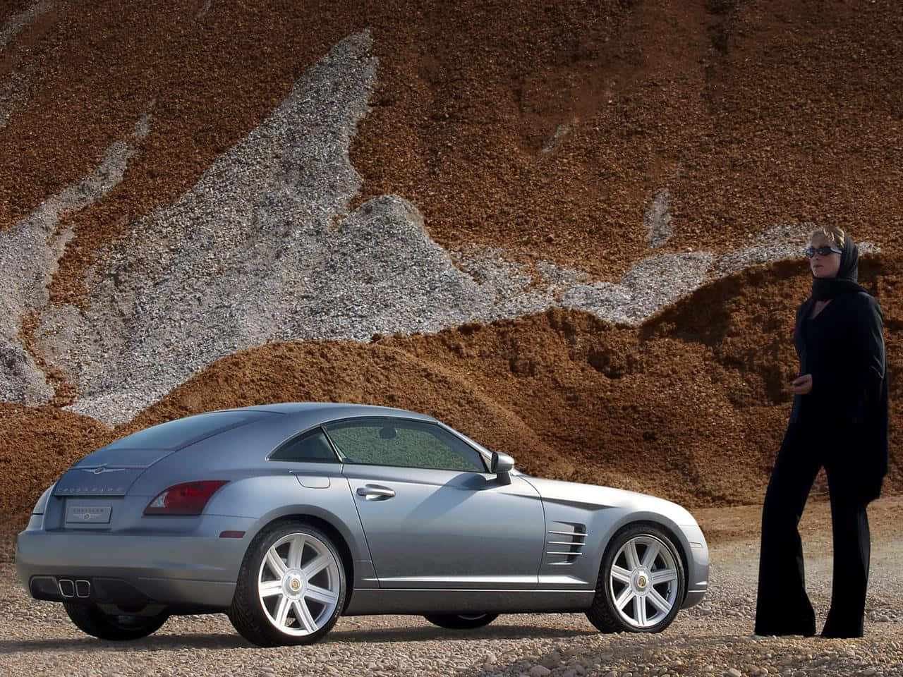 Stunning Chrysler Crossfire In A Picturesque City Background Wallpaper