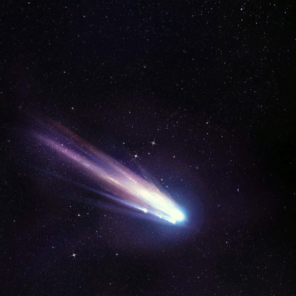 Stunning Comet With Radiant Tail Wallpaper