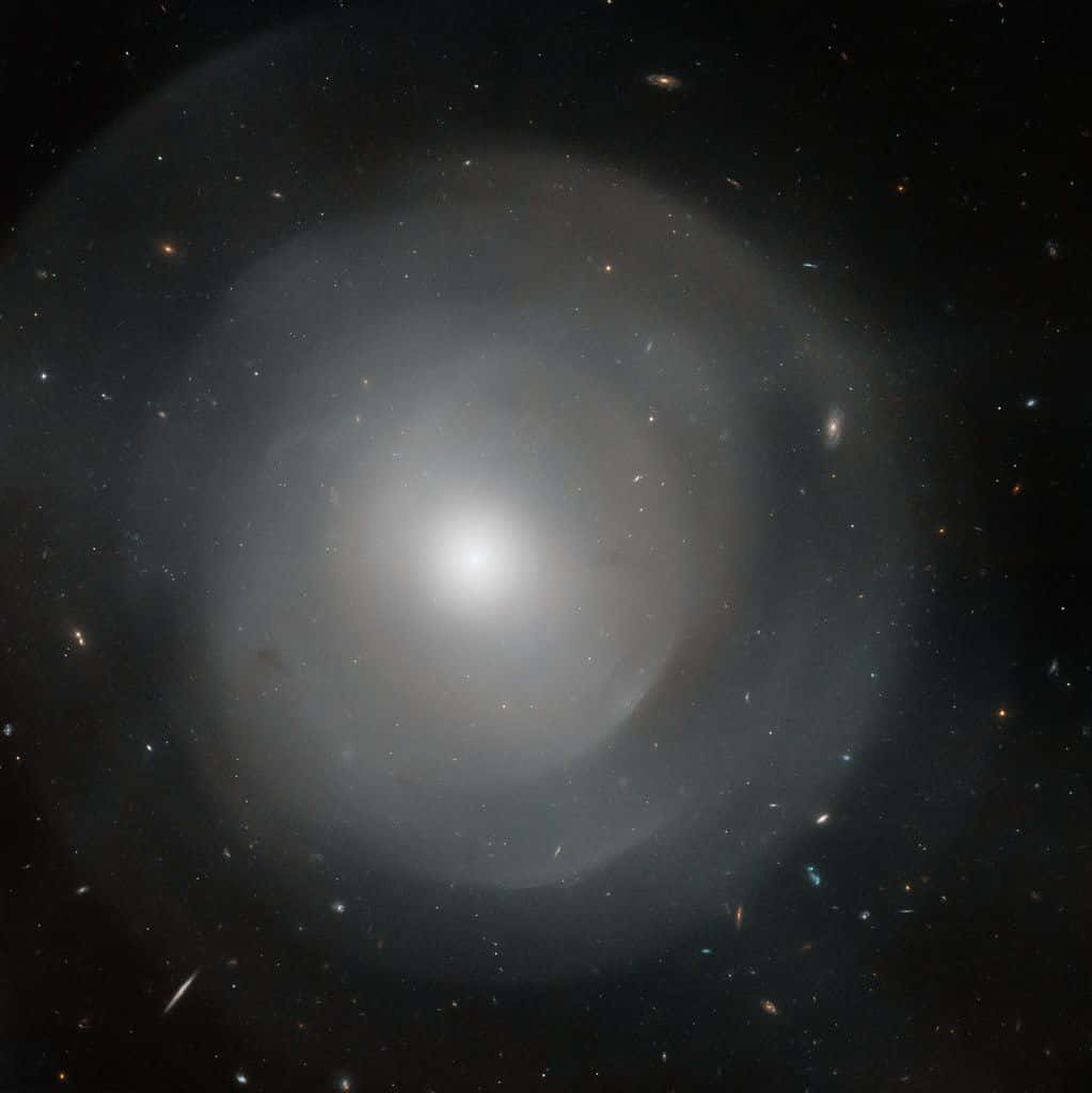 Stunning Elliptical Galaxy In Cosmic Space Wallpaper