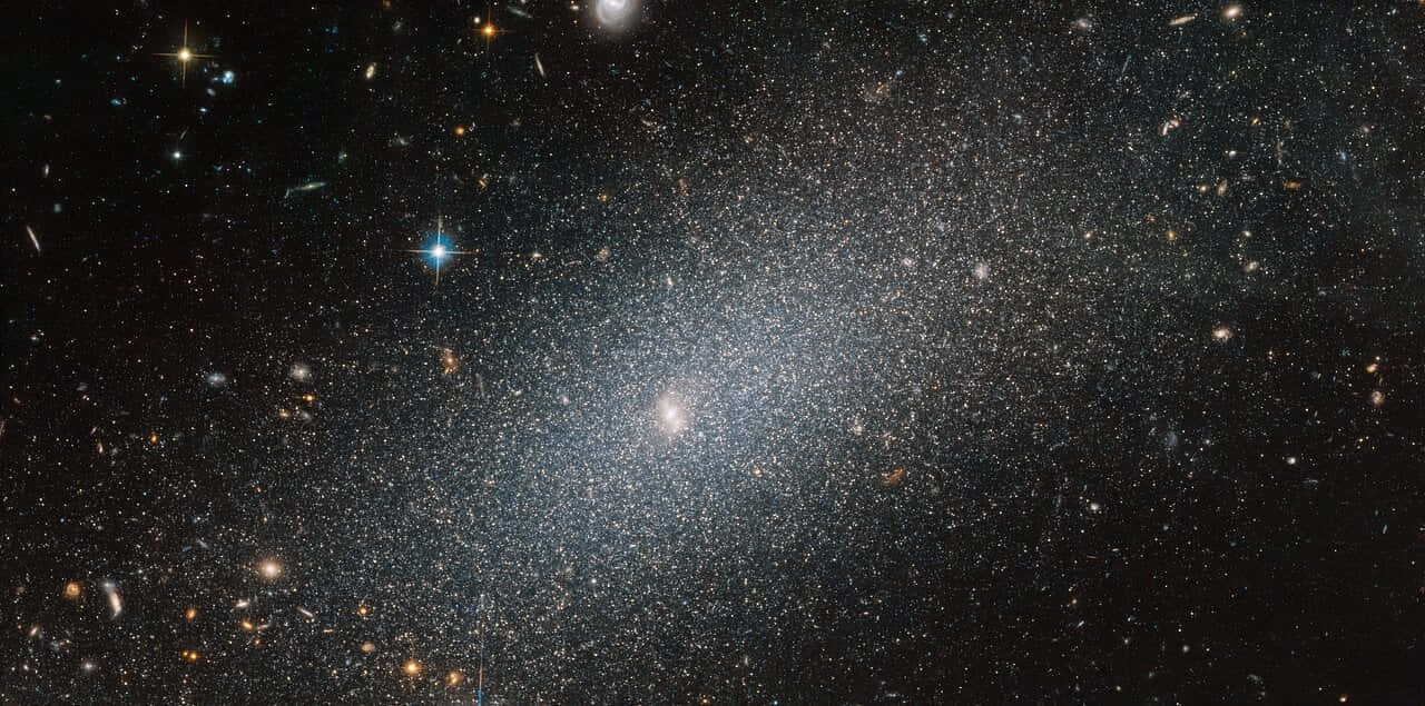 Stunning Elliptical Galaxy In Deep Space Wallpaper