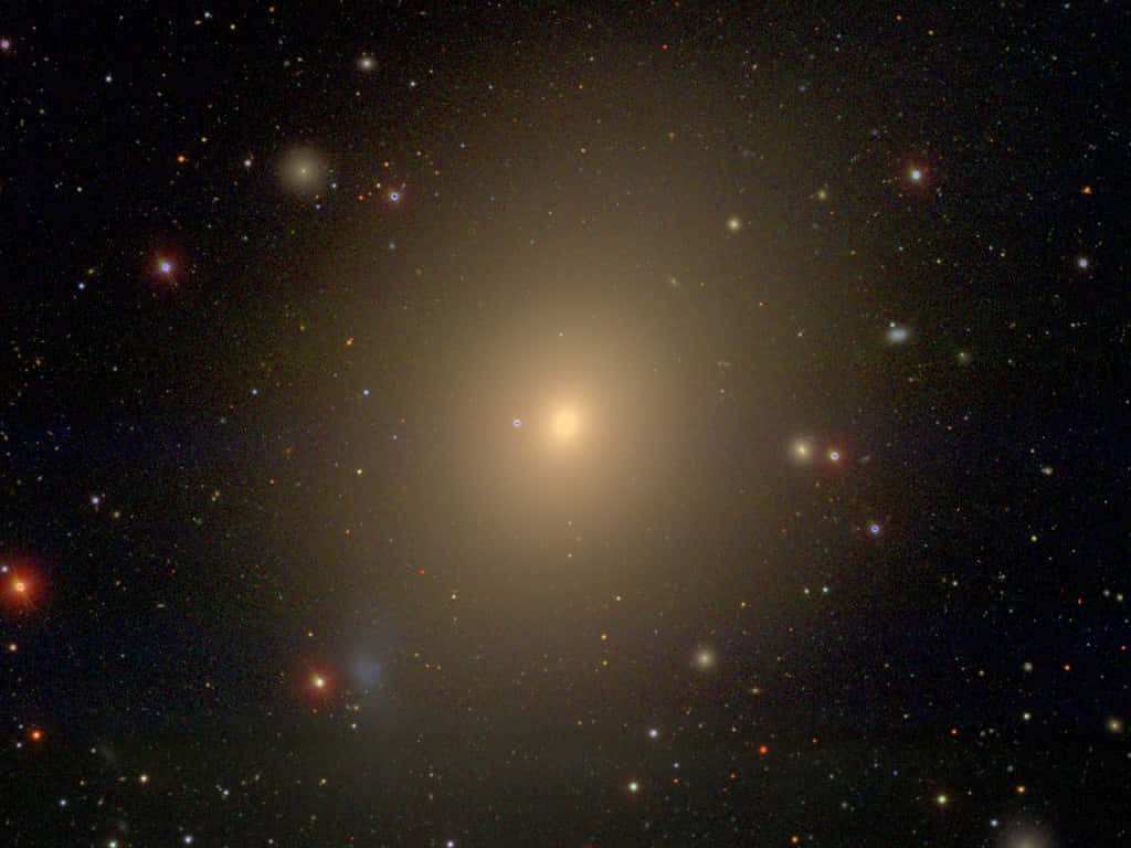 Stunning Elliptical Galaxy In Space Wallpaper